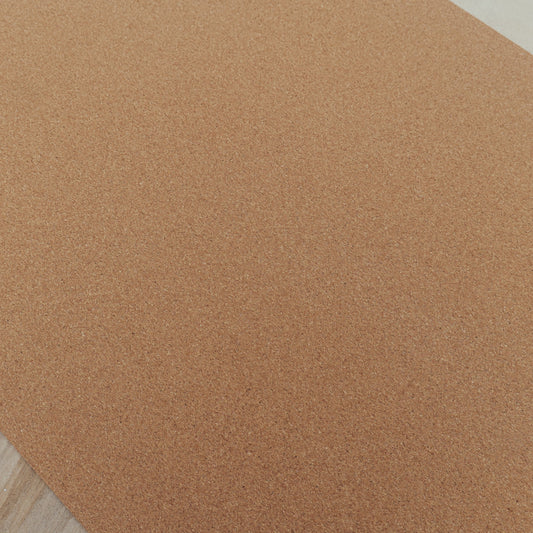 Original cork and natural rubber yoga mat. No detailing except for logo.